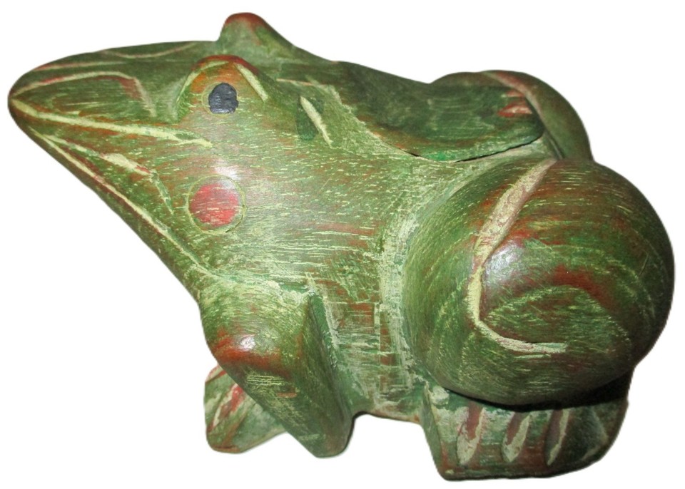 A hand-carved wooden folk art frog with a secret compartment — the craftsmanship, whimsy, and hidden-storage element make this a genuinely delightful one-of-a-kind find.