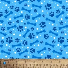 Cotton Paws and Bones Dogs Paw Prints Light Blue Fabric Print by Yard D763.95