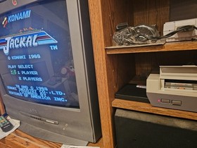 Lotto 5 giochi/manuali NES Jackal, Rush N Attack, QBert, Rad Racer, Foreman KO testati