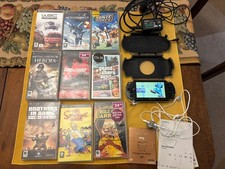 Sony PSP handheld Console 9 games, pristine, with Original Charger, Case etc