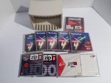 10 Zip 100mb disks and storage rack
