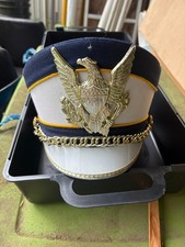 Marching Band Slant Hats from DeMoulin music supply. Blue/White with Gold Trim