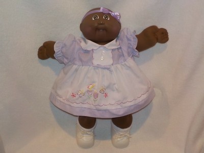 black bald cabbage patch doll