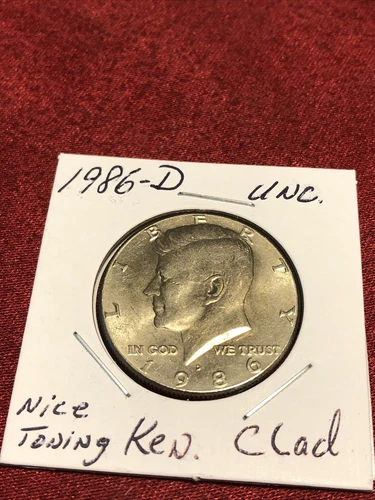 1986-D 50C KENNEDY SLIGHT TONING UNCIRCULATED HALF DOLLAR INSURED
