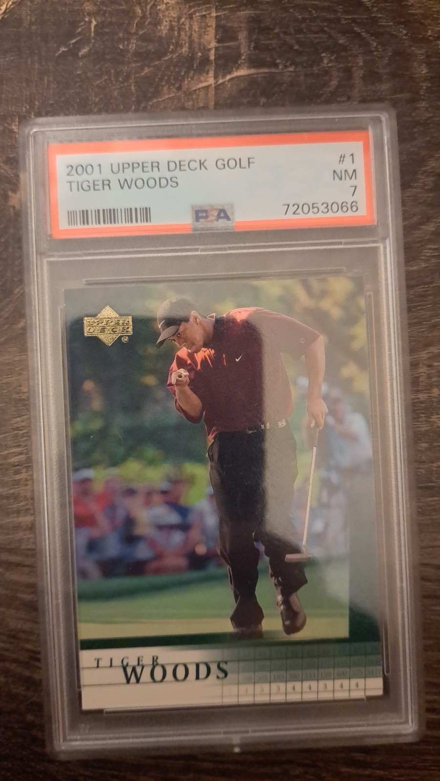 2001 Upper Deck Golf #1 Tiger Woods (RC) – PSA 7 NM view 1