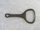 ANTIQUE 1920s LAURENTIA DAIRY ALBERTA CANADA ADVERTISING CAST IRON BOTTLE OPENER — photo 1