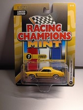 Racing Champions Mint 1969 Ford Mustang Boss 302 Limited Edition Yellow Diecast