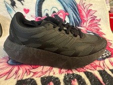 Adizero Aruku sneakers in the Core Black / Carbon / Iron Metallic
