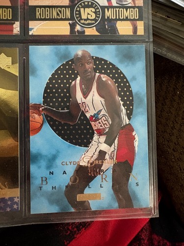 Clyde Drexler #4 1995 Skybox E XL Natural Born Thrillers card