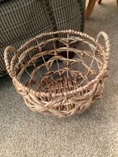 wicker basket round with handles. Approx 9 1/2 long, depth about 9 very nice