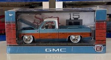 M2 Machines 1:24 1976 GMC Sierra Grande 15 Blue Diecast Pickup Truck Model