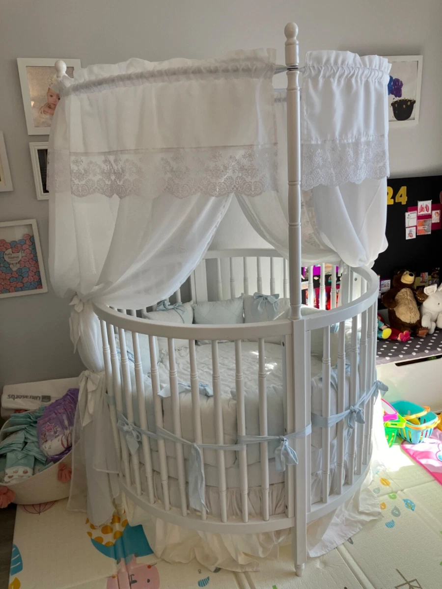 Round white best sale crib
