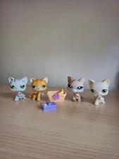 Littlest Pet Shops 4 cats with Hasbro picnic basket and food accessory.