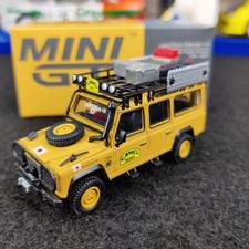 VOITURE MINI GT LAND ROVER DEFENDER 110 1989 CAMEL TROPHY AMAZON 1:64 NEUF