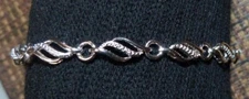  Zales  Diamond Accent Flame Bracelet in Sterling Silver - 7.5"