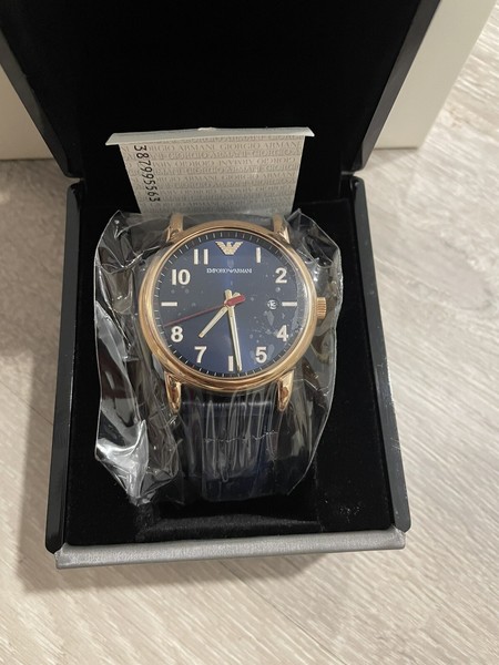 reloj analogico hombre