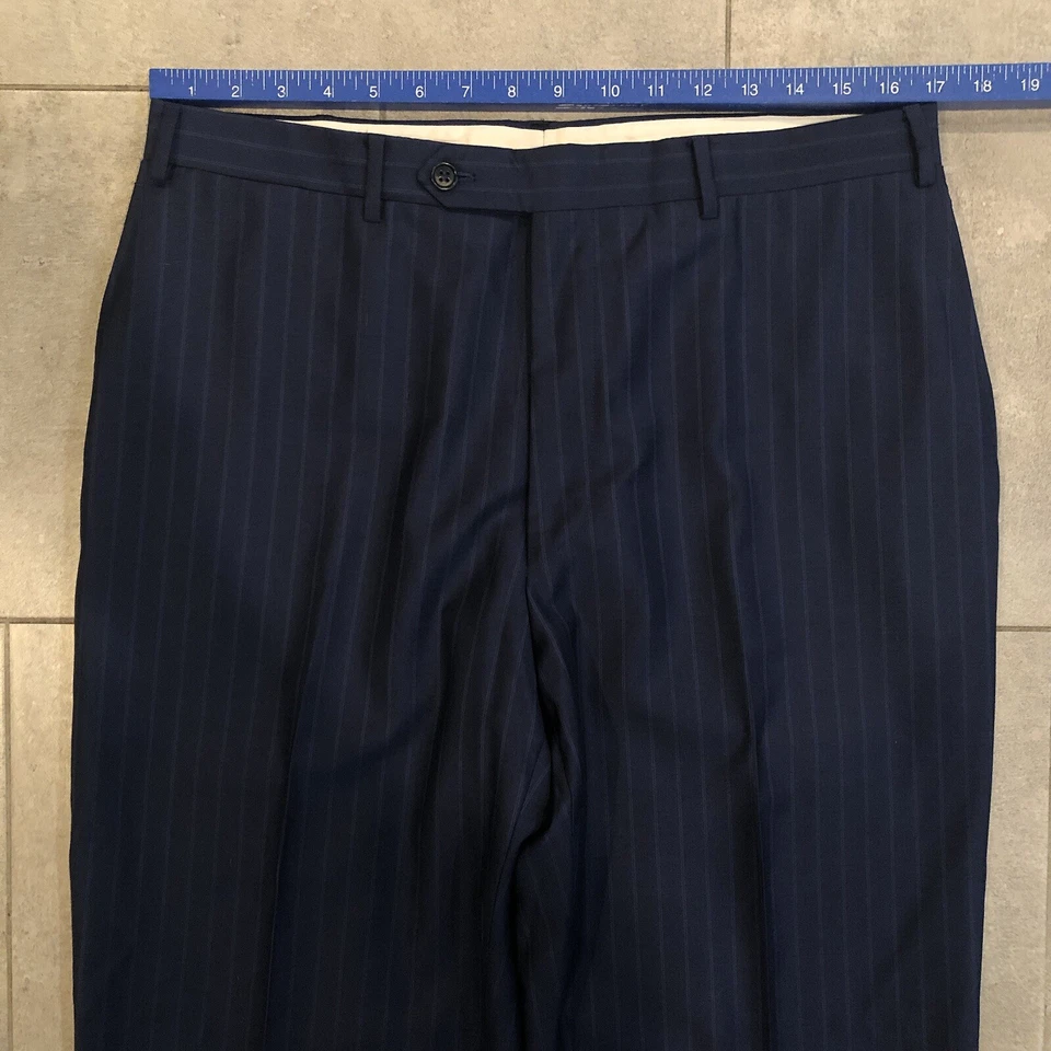 Pantalones de vestir Canali 1934 para hombre 34x29 azul lana Tessuto frente plano Italia Foto 2 de 4