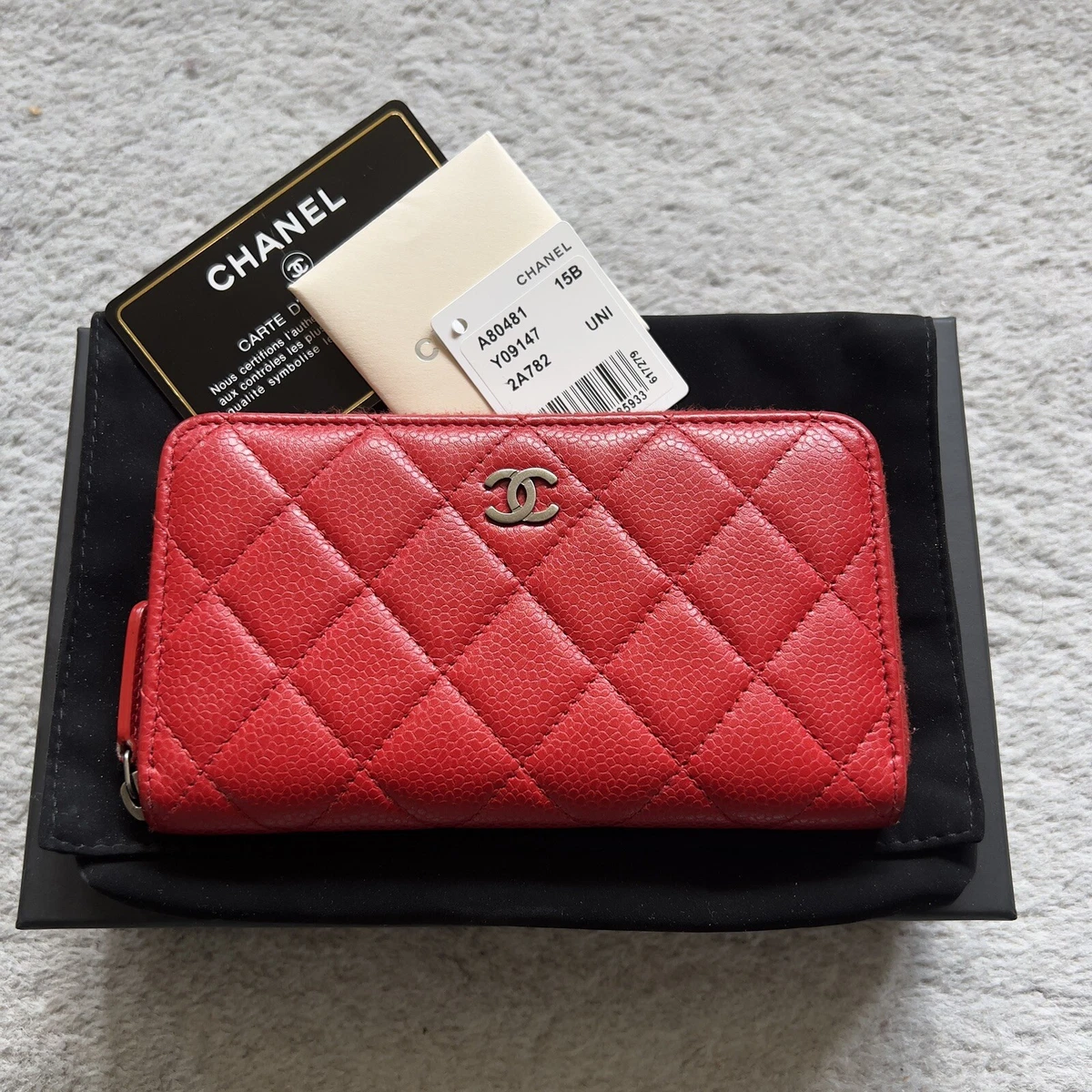 CHANEL Caviar Quilted Small Zip Around Wallet Red