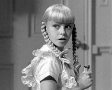Patty Mccormack As The Evil Rhoda Holding Matches The Bad Seed 8x10 Picture Cele