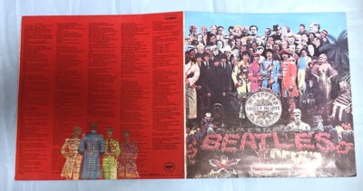 The Beatles Sgt. Pepper's Lonely Hearts Club Band red and