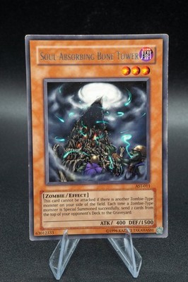 Yugioh! MP Soul-Absorbing Bone Tower - AST-011 - Rare - 1st Edition Mod Play MP