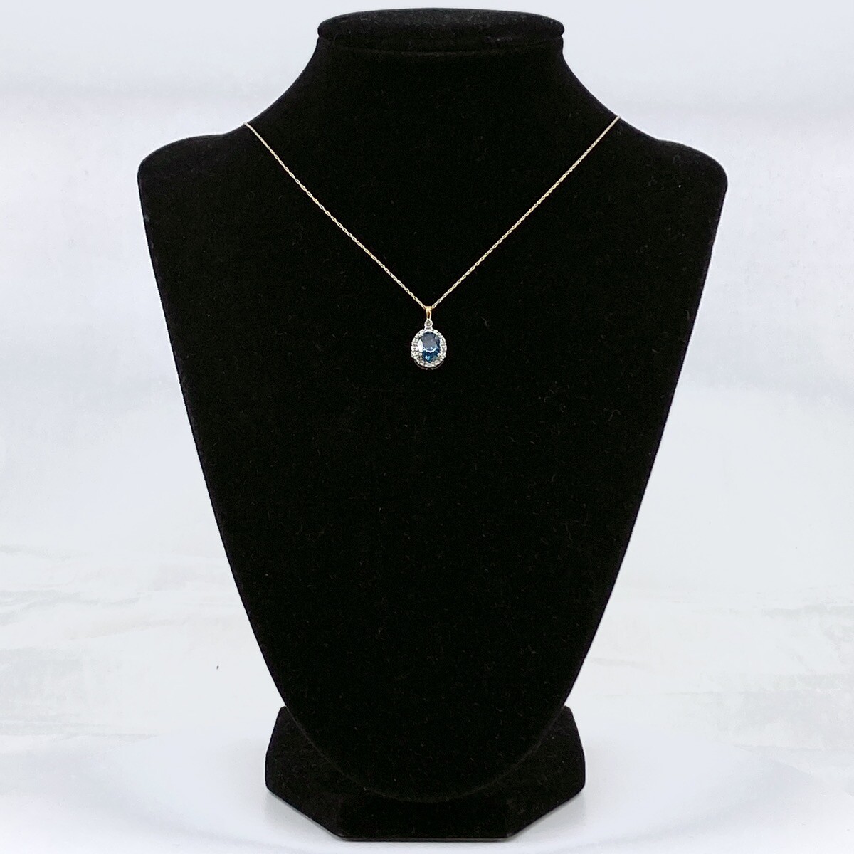 10K Yellow Gold Oval Blue Topaz & 0.15ctw Diamond Halo 18 10K Yellow Gold Oval Blue Topaz & 0.15ctw Diamond Halo 18