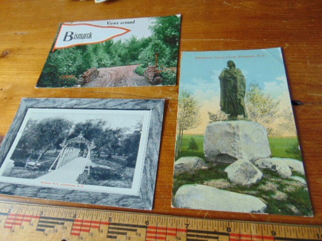 Three antique North Dakota post cards- Sakakawea Guide, Nickeus Park, pennant