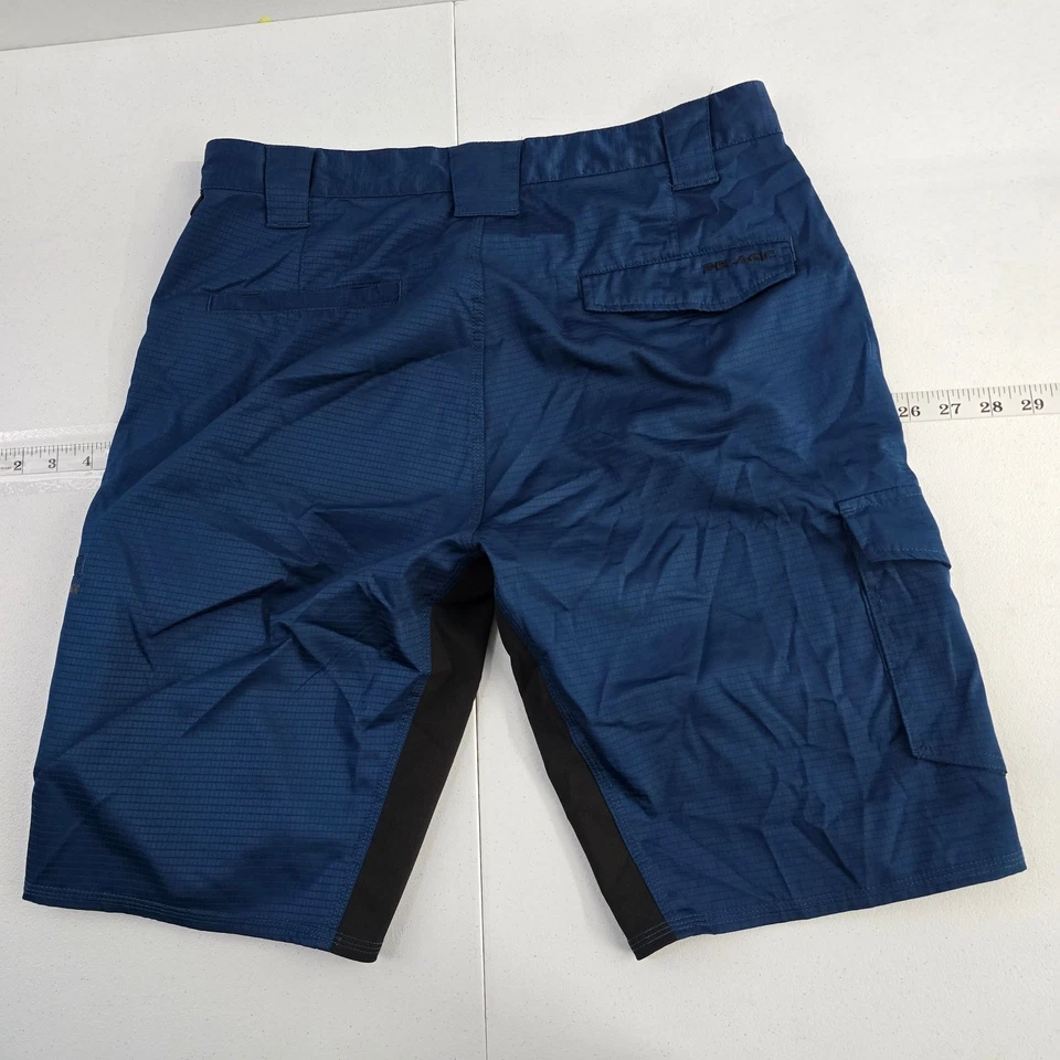 Гибридные рыболовные шорты Pelagic Dri-Flex мужские размер 32 синие с карманами для груза - Изображение 2 из 4