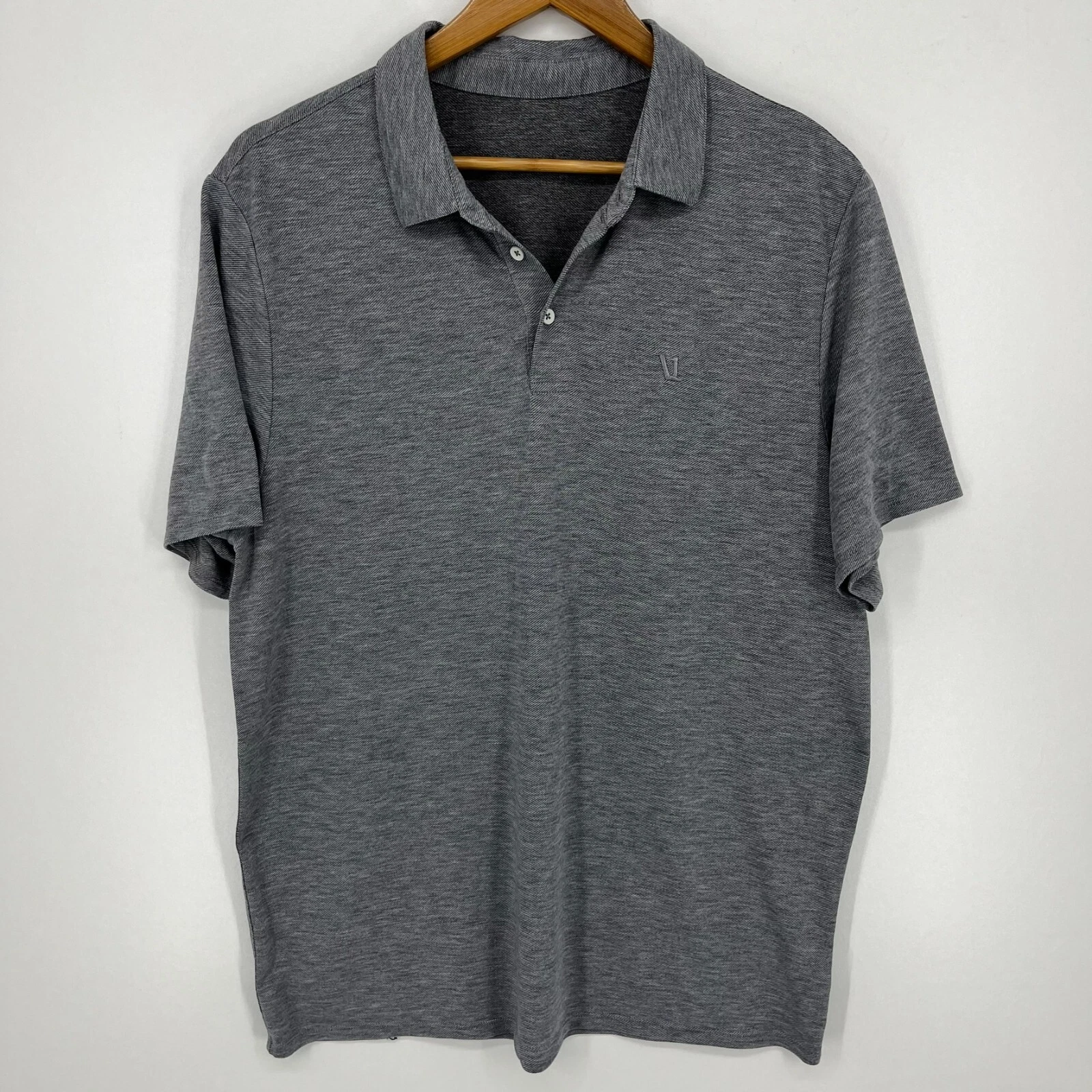 vuori polo short sleeve collared moisture wicking v logo shirt