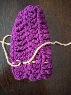 Medium Sozed Purple Drawstribg Bage With Pale Orange Side Stitching And String