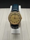 Vintage Timex Quartz Mens Watch Gold Tone Champagne Dial Navy Leather Strap