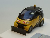 Offer: Busch Smart Fortwo Facelift Gelb/Schwarz Mit Schneeschieber - 46148, 1:87