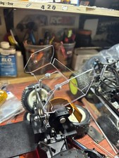 RC10 Gold Pan Clear Wing . Wing wire And Buttons. Assembled