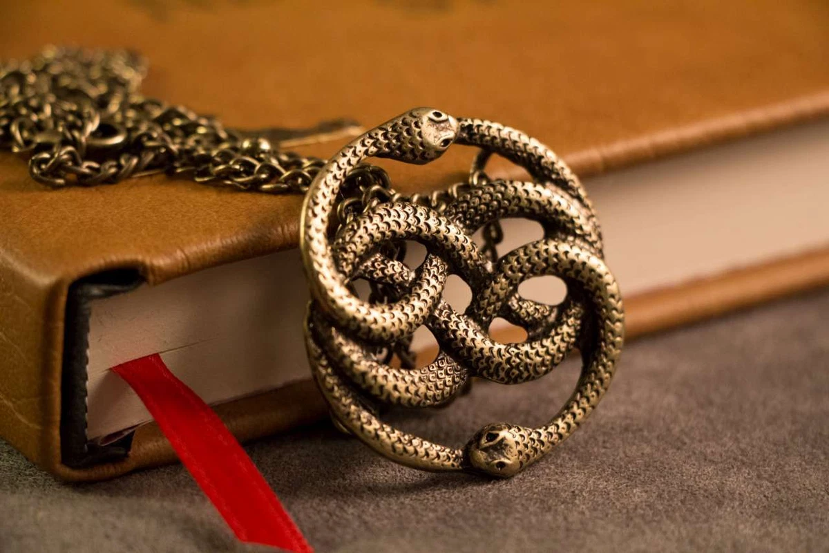 Neverending story shop pendant