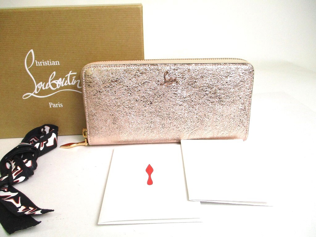 Auth Christian Louboutin Panettone Rose Gold Leather Round Zip