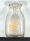 Vintage Quality OTTO’S Half Pint milk Glass Bottle Clear w/ Orange ACL DURAGLAS