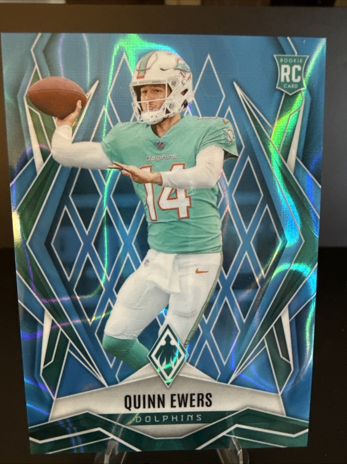 2025 Panini Phoenix - Rookies Quinn Ewers #159 Light Blue Lava /325 (RC)