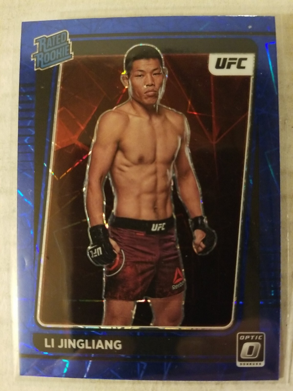 2022 Donruss Optic UFC Li Jingliang RC Rated Rookie #113 Blue Velocity Prizm