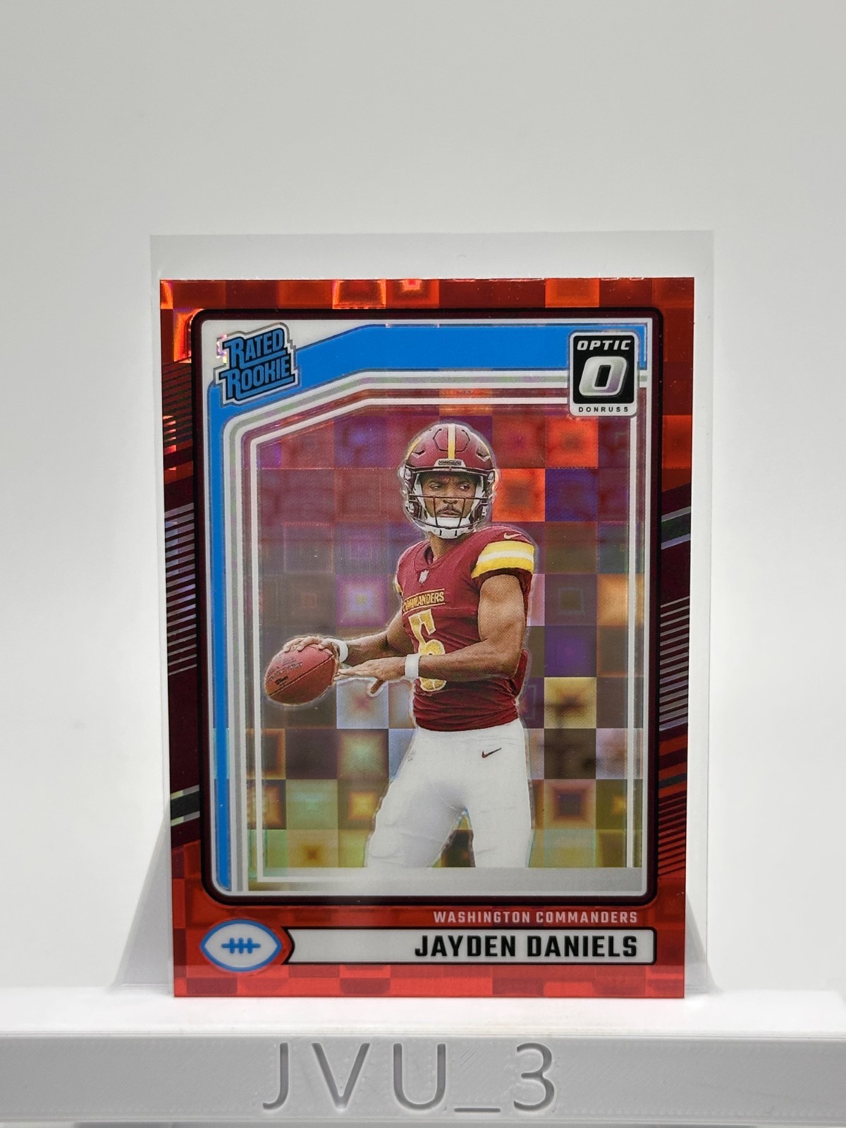 2024 DONRUSS JAYDEN DANIELS OPTIC PREVIEW RED PANDORA RATED ROOKIE No. 389 (B)