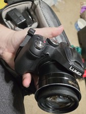 Panasonic LUMIX DMC-FZ70 16.1MP Digital Camera With Case Battery And Charger