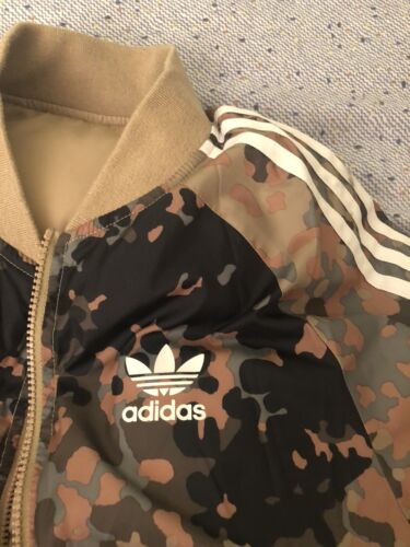 corta vento adidas pharrell williams