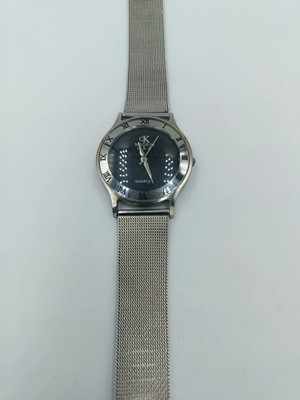 Elegante CK Calvin Klein Damenarmbanduhr mit Milanaiseband und römischen Ziffern
