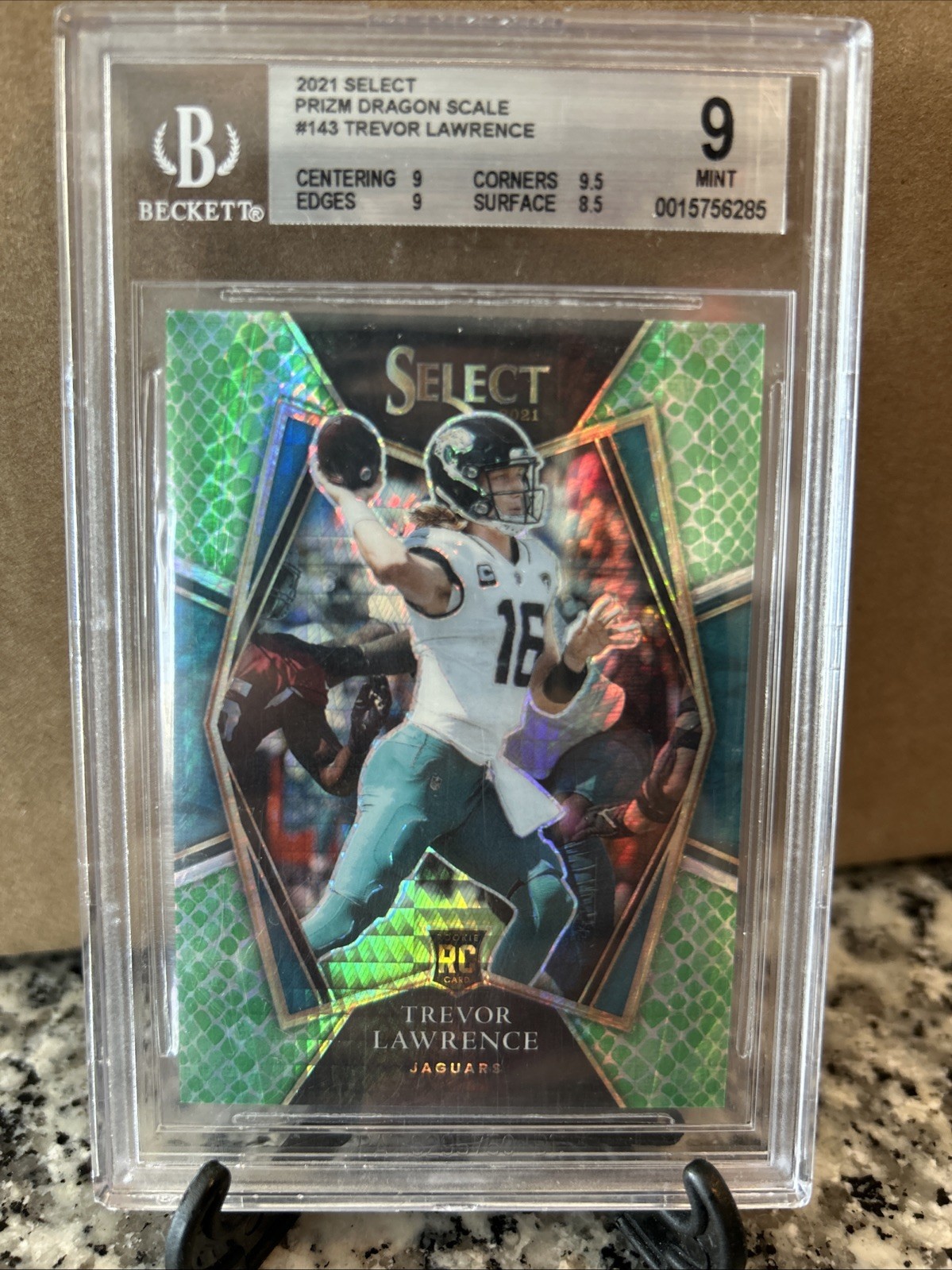 2021 Panini Select - Premier Trevor Lawrence #143 Dragon Scale Prizm /89 (RC)