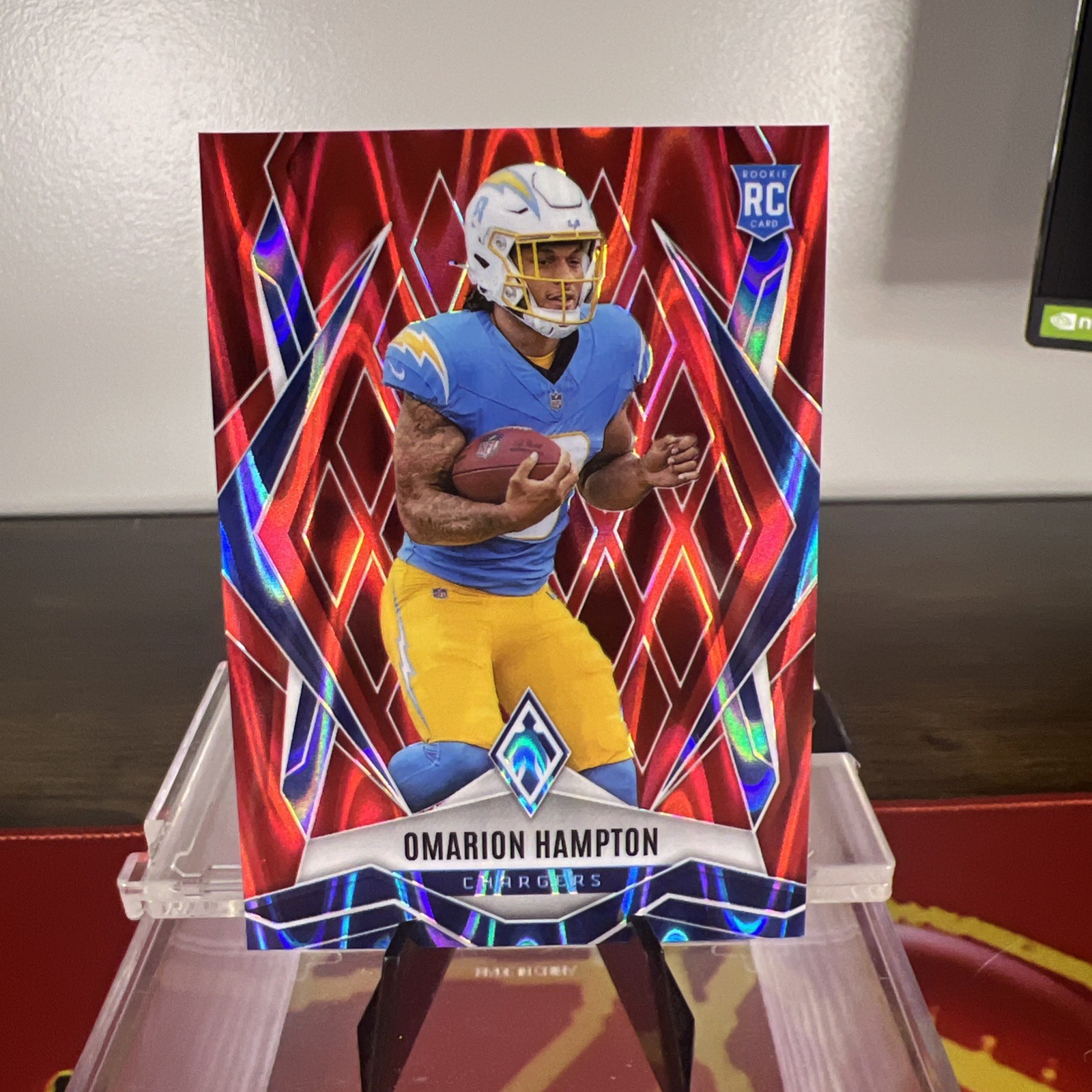 2025 Panini Phoenix - Omarion Hampton #192 Red Seismic Prizm Rookie /99 (RC)