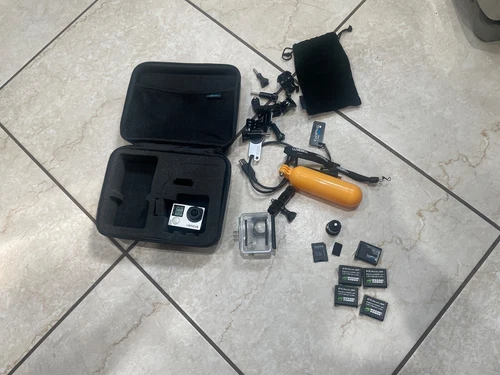 GoPro HERO4 Silver Action Camera with batteries, accessories, etc.