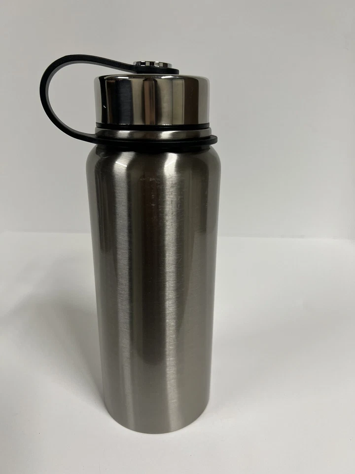 Botella de agua de acero inoxidable aislada al vacío de 20 oz, bebidas frías y calientes sin BPA Foto 3 de 4