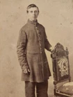 Civil War Full standing CDV of unidentified soldier wearing frock coat Rochester