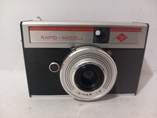 macchina fotografica pellicola vintage agfa modello rapido con retro trasparente - dimostrazione negozio