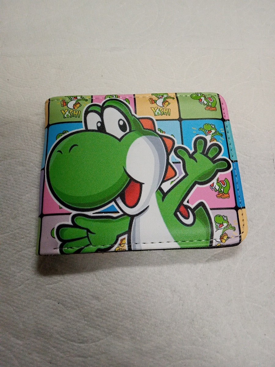 Yoshi Print Bi-Fold Wallet. New with tags. Shipped with USPS First