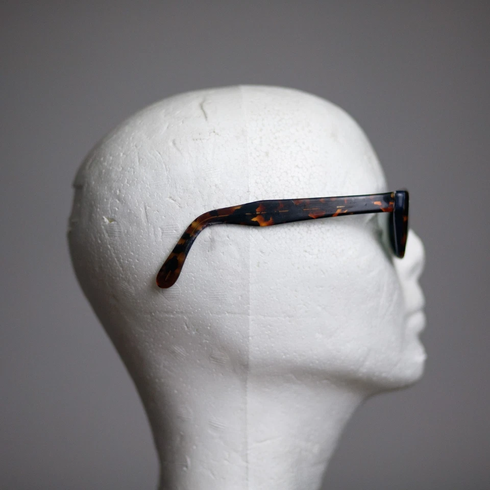 Gafas de sol vintage Tommy Hilfiger años 90 monturas tortuga Foto 3 de 4